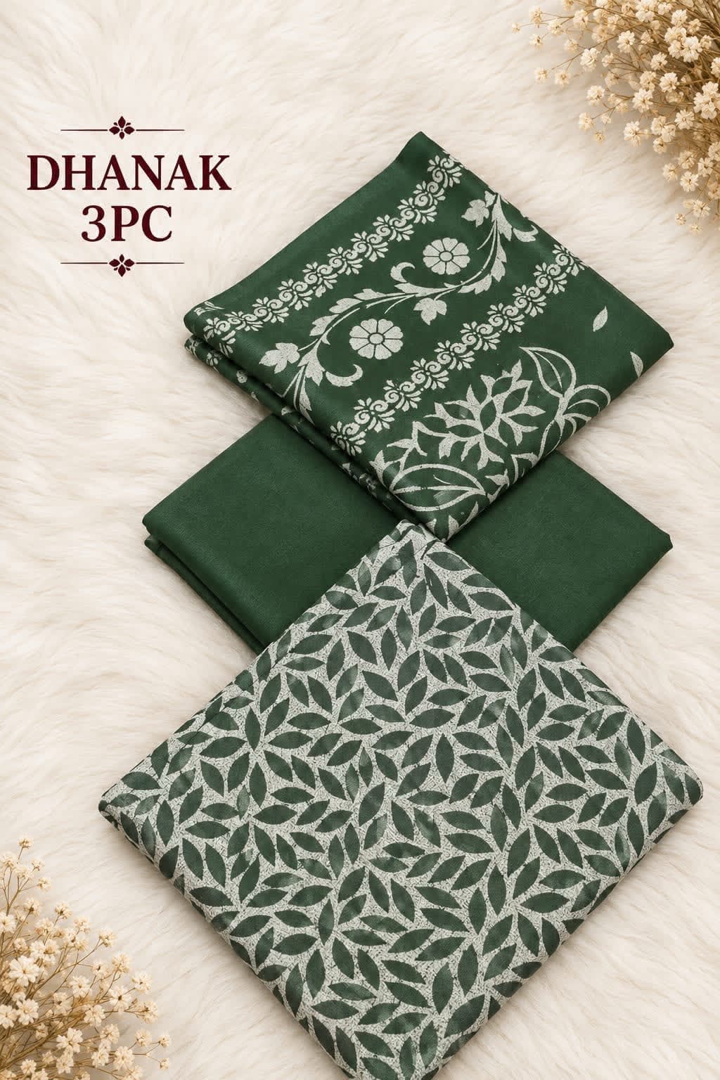 Folded bottle green Dhanak block-print shirt, printed dupatta and plain trouser fabric