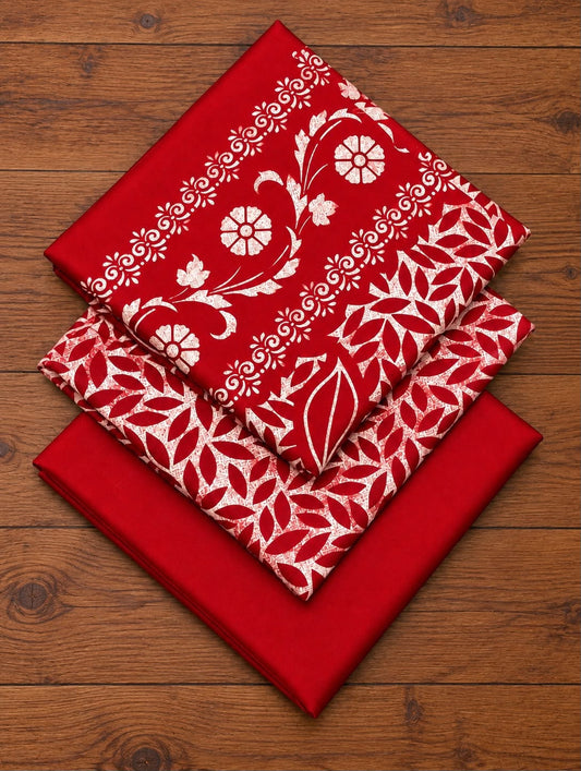 Folded red Dhanak block-print shirt, printed dupatta and plain trouser fabric