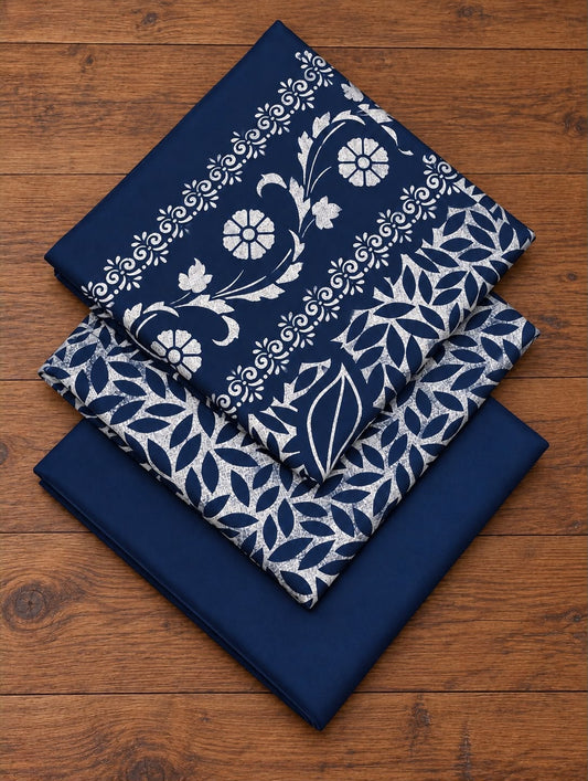 Folded navy Dhanak block-print shirt, printed dupatta and plain trouser fabric