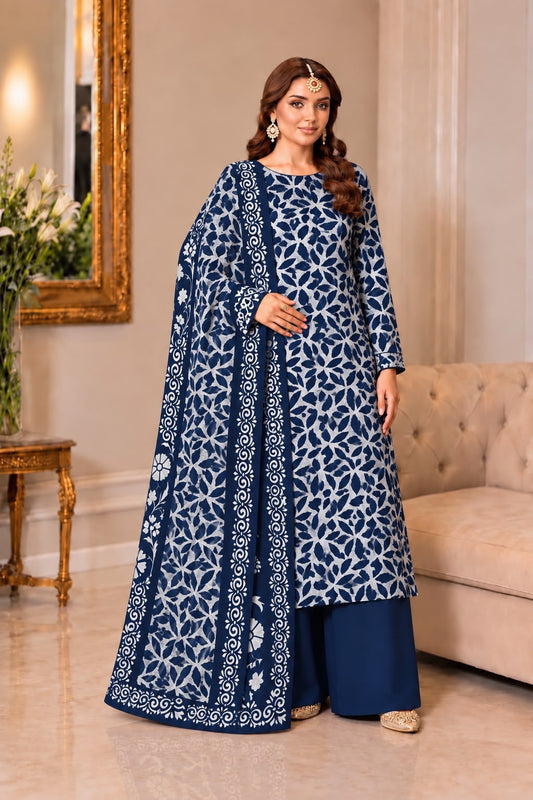 Model wearing navy Dhanak block-print 3-piece suit with printed dupatta and plain trouser